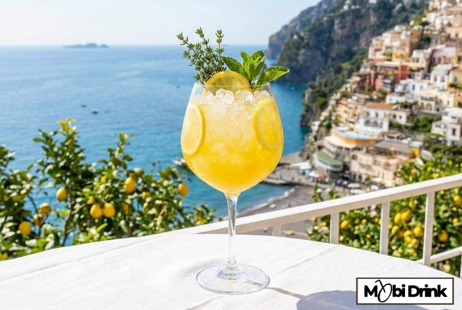 Żółty drink Limoncello Spritz z cytryną