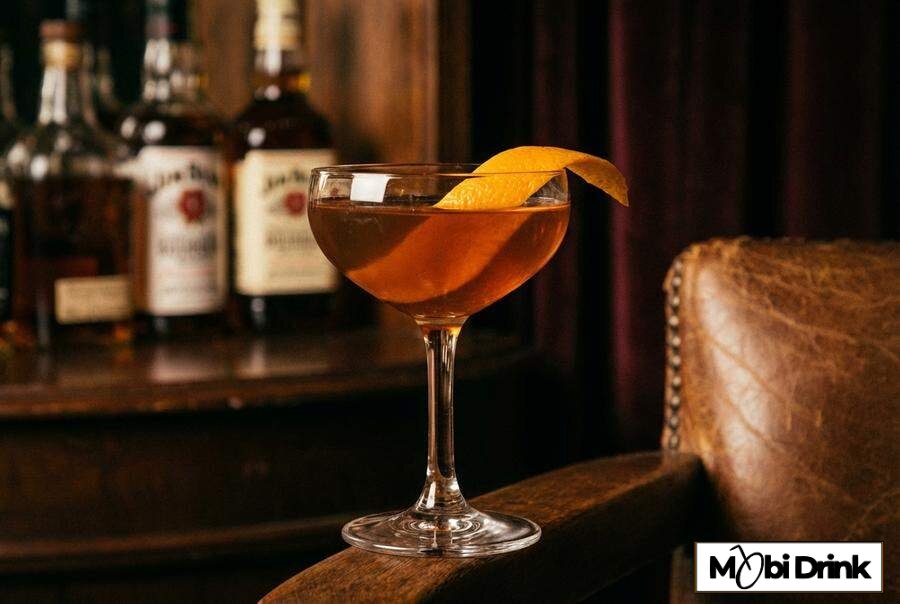 Drink Revolver w kieliszku coupe