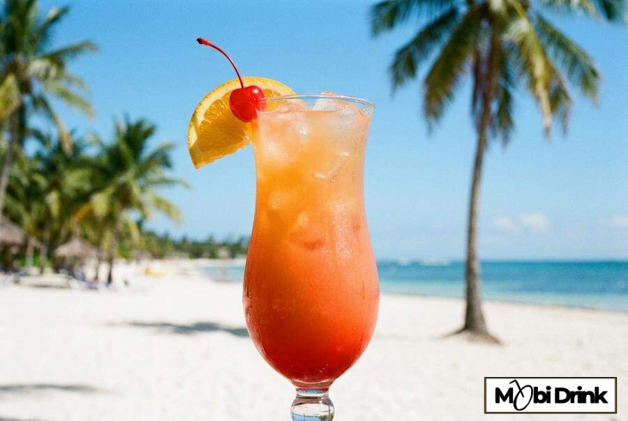 Kolorowy drink Sex on the Beach z pomarańczą